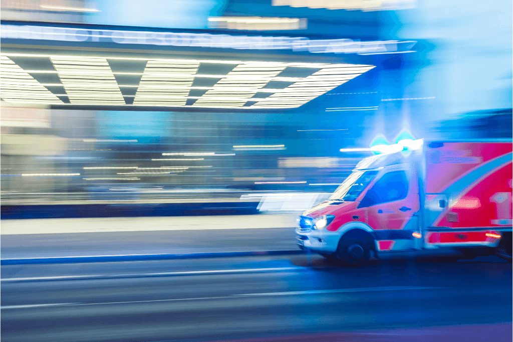 Ambulance driving in a blur.